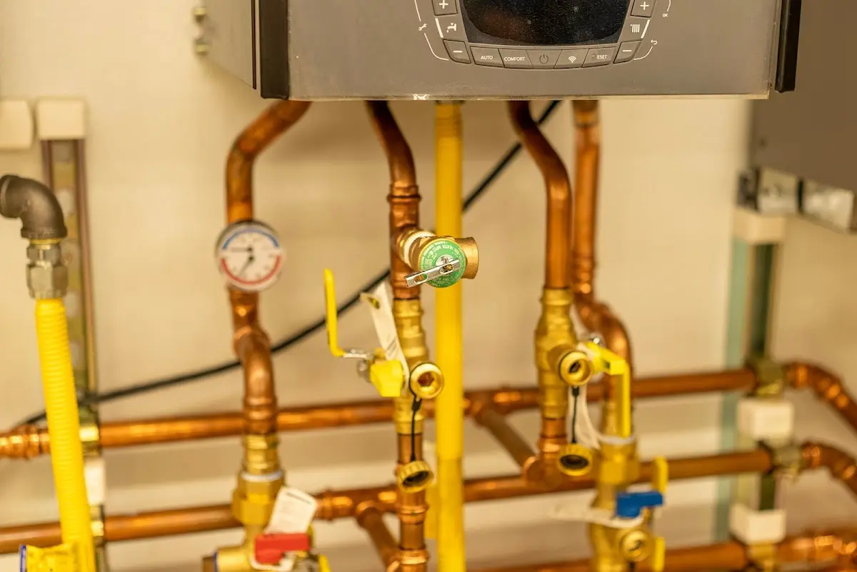 Licensed technician providing Backflow Prevention for a homeowner in Staples